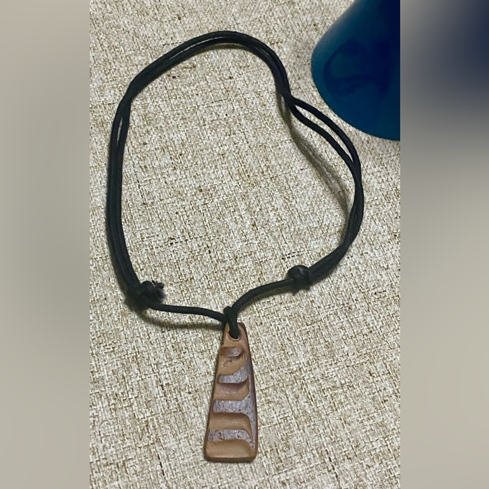 Brown and Black Pendant Necklace (piece of carved rock stone)